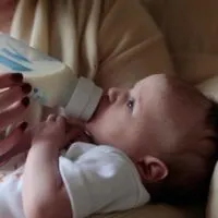 Can you put cooked oatmeal in a baby bottle? Baby eating oatmeal from a bottle.