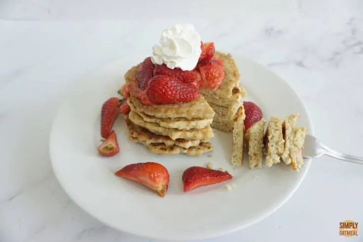 Cut coconut oatmeal pancakes on a plate.