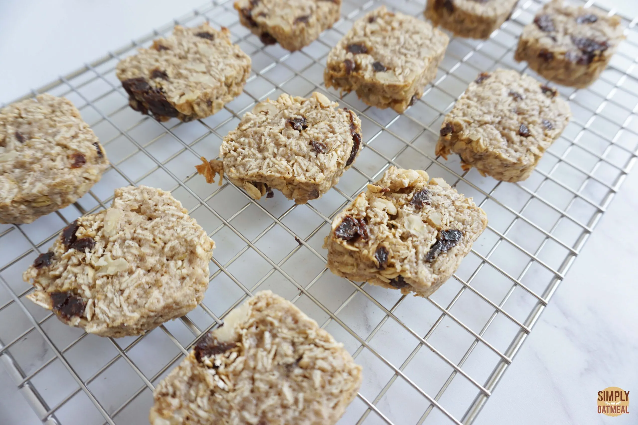 Hot carrot cake oatmeal cookies on wire rack.