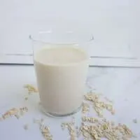 Oat milk like oatly in a glass cup