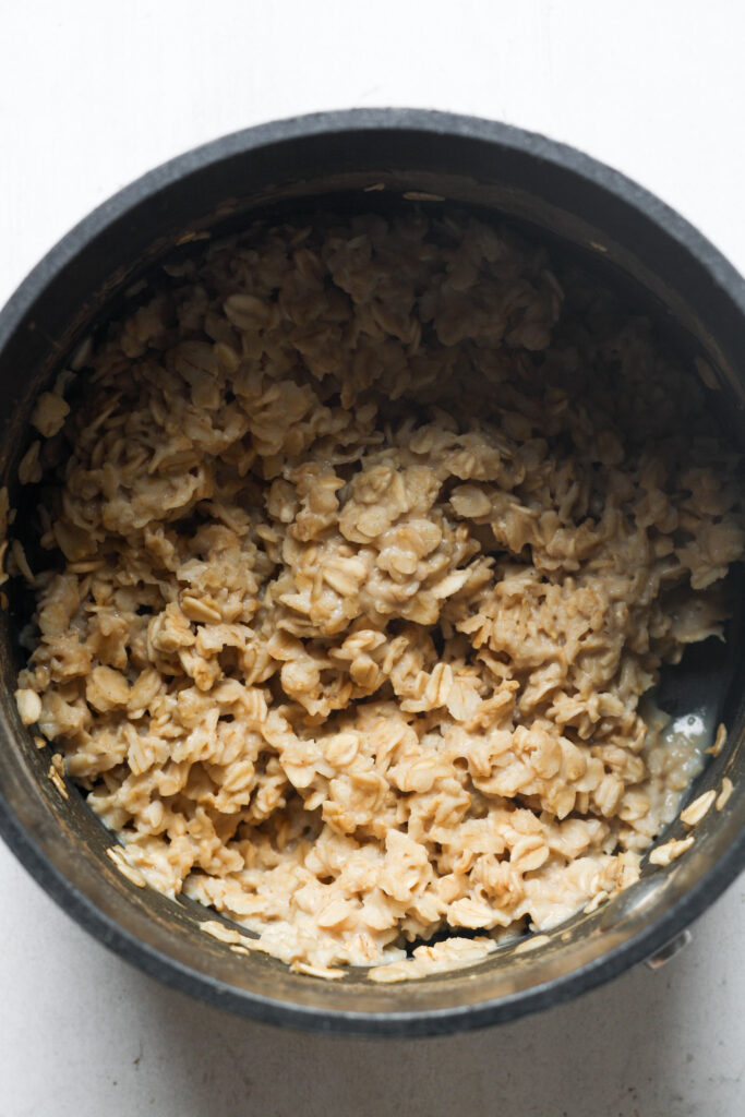 Thick nut butter oatmeal in pot.
